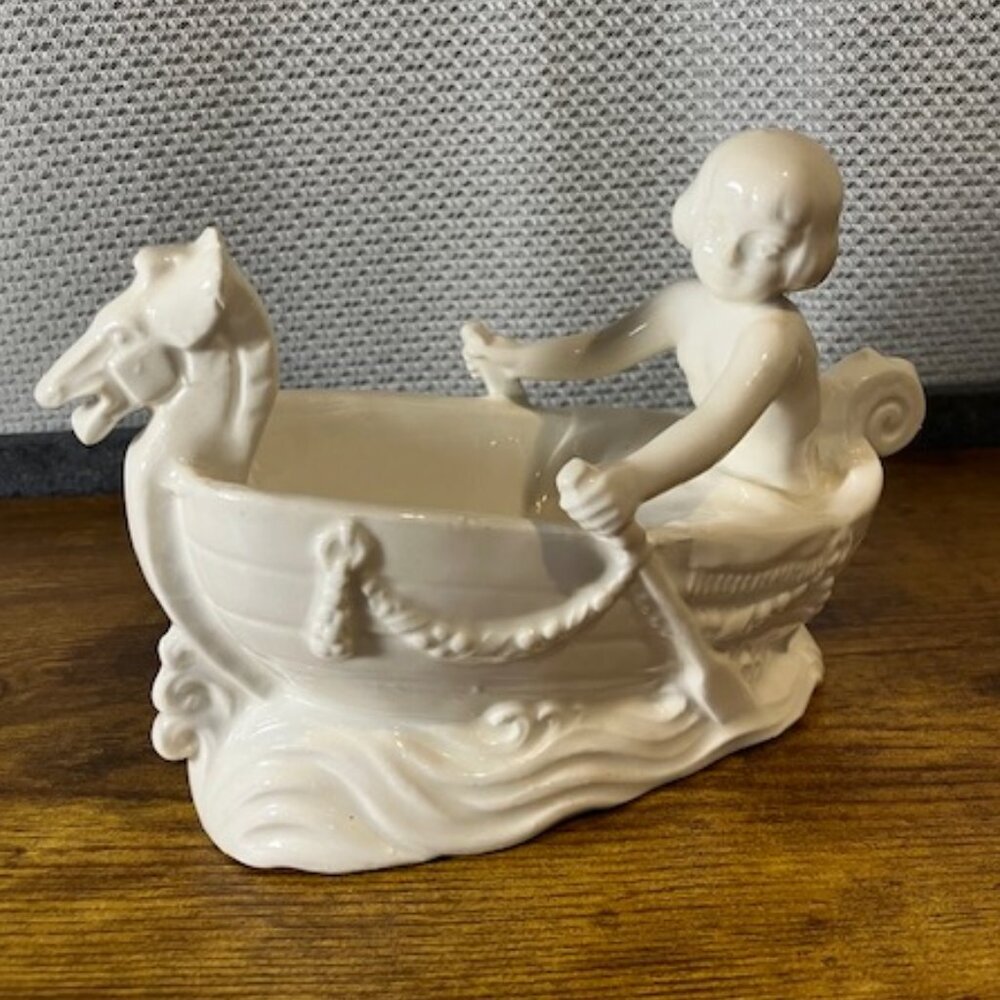 Erphila of Czechosolovakia Ceramic Child in a Boat Decor 7" White‎